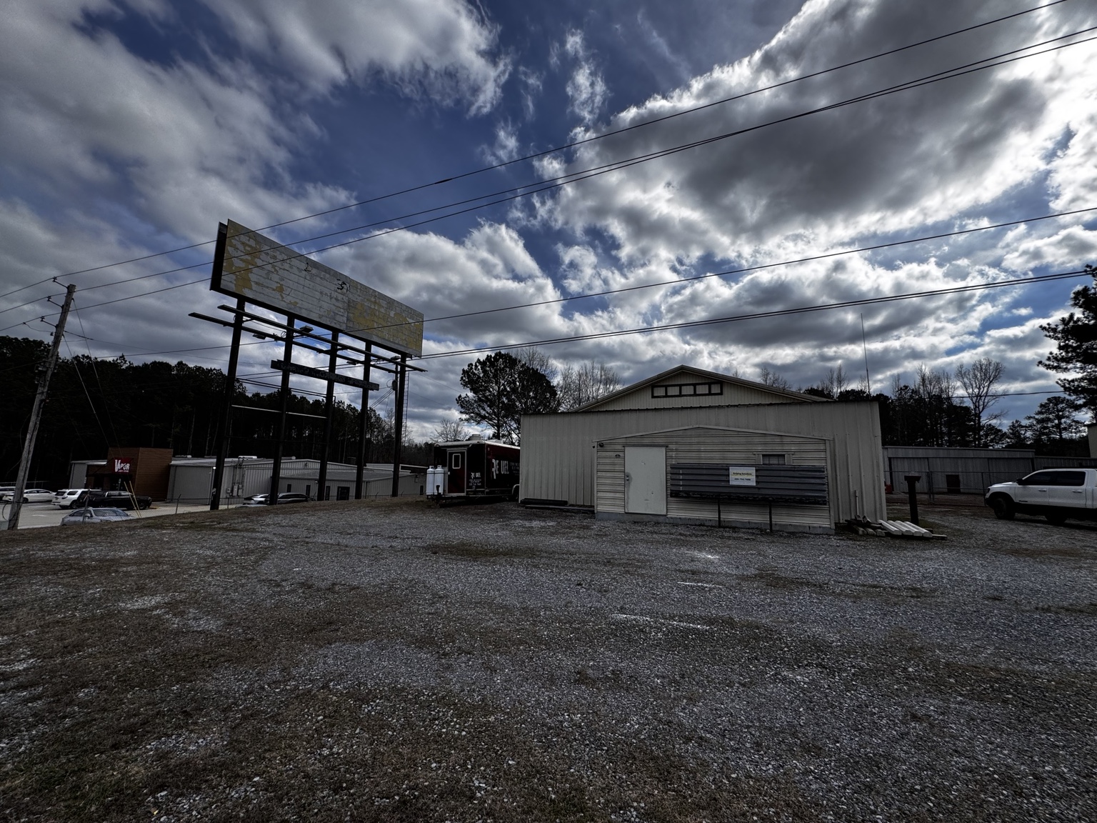Building and billboard along the Highway 280 frontage.